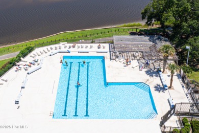 Build your coastal retreat on this .33-acre waterfront lot in on Lockwood Folly Country Club in North Carolina - for sale on GolfHomes.com, golf home, golf lot