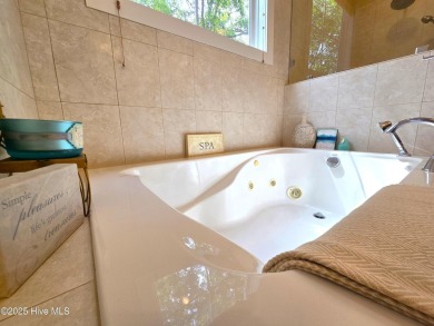 Experience lakefront living in this beautifully updated home on on Harbour Point Golf Club in North Carolina - for sale on GolfHomes.com, golf home, golf lot