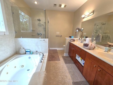 Experience lakefront living in this beautifully updated home on on Harbour Point Golf Club in North Carolina - for sale on GolfHomes.com, golf home, golf lot