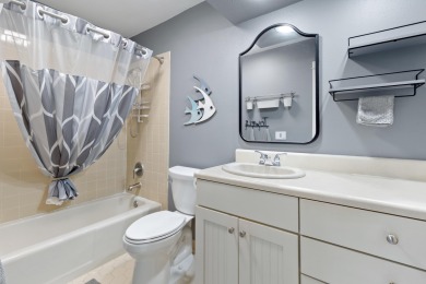 Nestled on the pond in the sought-after Fairways community of on Sandestin Golf and Beach Resort - The Links in Florida - for sale on GolfHomes.com, golf home, golf lot