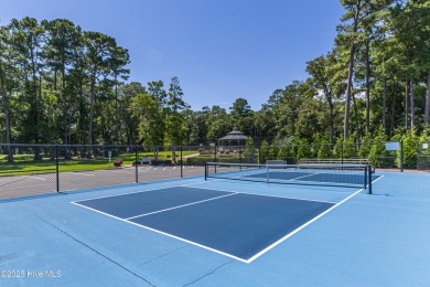Build your coastal retreat on this .33-acre waterfront lot in on Lockwood Folly Country Club in North Carolina - for sale on GolfHomes.com, golf home, golf lot