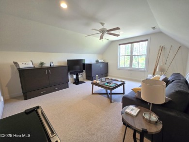 Experience lakefront living in this beautifully updated home on on Harbour Point Golf Club in North Carolina - for sale on GolfHomes.com, golf home, golf lot