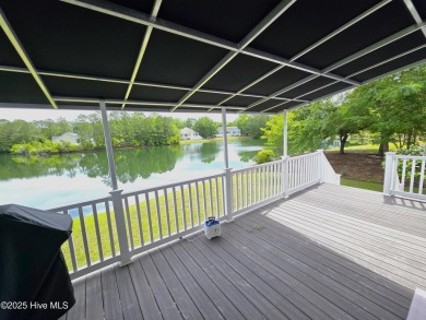 Experience lakefront living in this beautifully updated home on on Harbour Point Golf Club in North Carolina - for sale on GolfHomes.com, golf home, golf lot