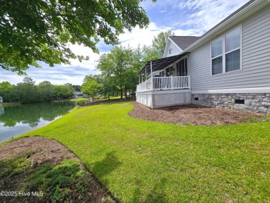Experience lakefront living in this beautifully updated home on on Harbour Point Golf Club in North Carolina - for sale on GolfHomes.com, golf home, golf lot