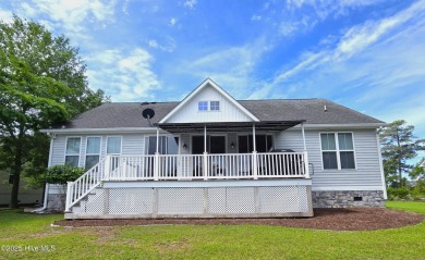 Experience lakefront living in this beautifully updated home on on Harbour Point Golf Club in North Carolina - for sale on GolfHomes.com, golf home, golf lot