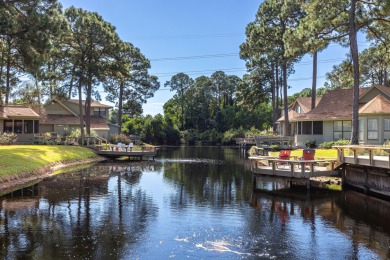 Nestled on the pond in the sought-after Fairways community of on Sandestin Golf and Beach Resort - The Links in Florida - for sale on GolfHomes.com, golf home, golf lot