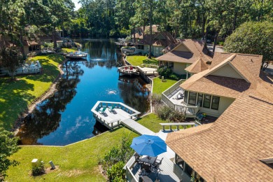 Nestled on the pond in the sought-after Fairways community of on Sandestin Golf and Beach Resort - The Links in Florida - for sale on GolfHomes.com, golf home, golf lot