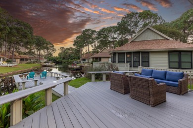 Nestled on the pond in the sought-after Fairways community of on Sandestin Golf and Beach Resort - The Links in Florida - for sale on GolfHomes.com, golf home, golf lot