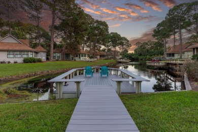 Nestled on the pond in the sought-after Fairways community of on Sandestin Golf and Beach Resort - The Links in Florida - for sale on GolfHomes.com, golf home, golf lot