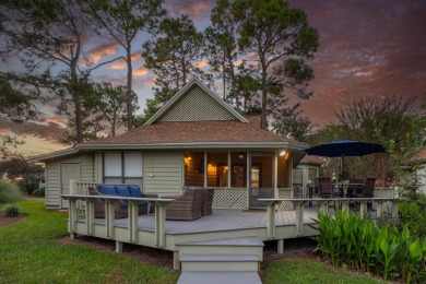 Nestled on the pond in the sought-after Fairways community of on Sandestin Golf and Beach Resort - The Links in Florida - for sale on GolfHomes.com, golf home, golf lot