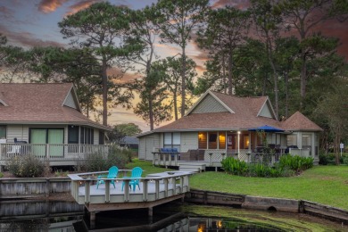 Nestled on the pond in the sought-after Fairways community of on Sandestin Golf and Beach Resort - The Links in Florida - for sale on GolfHomes.com, golf home, golf lot