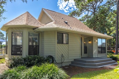 Nestled on the pond in the sought-after Fairways community of on Sandestin Golf and Beach Resort - The Links in Florida - for sale on GolfHomes.com, golf home, golf lot