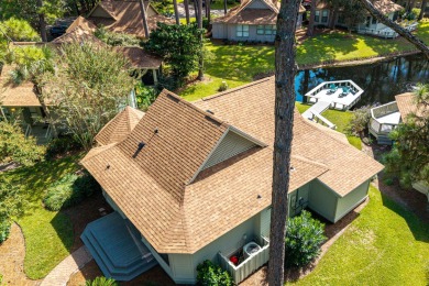 Nestled on the pond in the sought-after Fairways community of on Sandestin Golf and Beach Resort - The Links in Florida - for sale on GolfHomes.com, golf home, golf lot