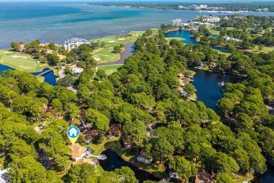 Nestled on the pond in the sought-after Fairways community of on Sandestin Golf and Beach Resort - The Links in Florida - for sale on GolfHomes.com, golf home, golf lot