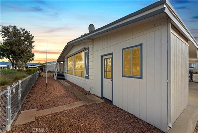 Step into your dream oasis with this exquisite 2-bedroom on Colonial Country Club in California - for sale on GolfHomes.com, golf home, golf lot