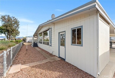 Step into your dream oasis with this exquisite 2-bedroom on Colonial Country Club in California - for sale on GolfHomes.com, golf home, golf lot