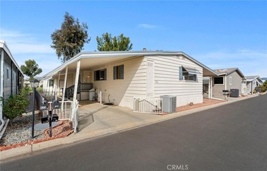 Step into your dream oasis with this exquisite 2-bedroom on Colonial Country Club in California - for sale on GolfHomes.com, golf home, golf lot
