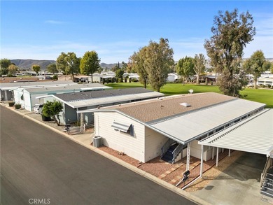 Step into your dream oasis with this exquisite 2-bedroom on Colonial Country Club in California - for sale on GolfHomes.com, golf home, golf lot
