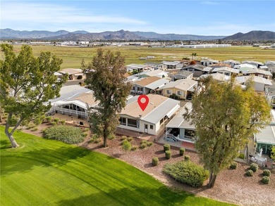 Step into your dream oasis with this exquisite 2-bedroom on Colonial Country Club in California - for sale on GolfHomes.com, golf home, golf lot