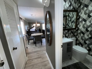 FURNISHED TURNKEY WITH A MASON & HAMLIN GRAND PIANO  in the on Kings Point Golf -Flanders Way in Florida - for sale on GolfHomes.com, golf home, golf lot