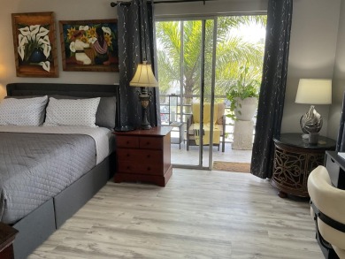 FURNISHED TURNKEY WITH A MASON & HAMLIN GRAND PIANO  in the on Kings Point Golf -Flanders Way in Florida - for sale on GolfHomes.com, golf home, golf lot
