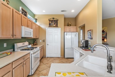 This open design great room design home has 2 bedrooms , 2 baths on Heritage Palms Golf Club in California - for sale on GolfHomes.com, golf home, golf lot