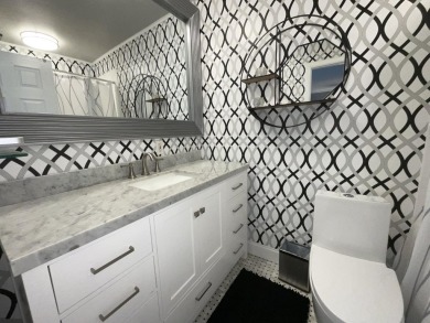 FURNISHED TURNKEY WITH A MASON & HAMLIN GRAND PIANO  in the on Kings Point Golf -Flanders Way in Florida - for sale on GolfHomes.com, golf home, golf lot