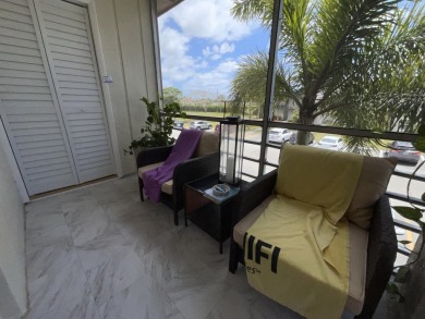 FURNISHED TURNKEY WITH A MASON & HAMLIN GRAND PIANO  in the on Kings Point Golf -Flanders Way in Florida - for sale on GolfHomes.com, golf home, golf lot