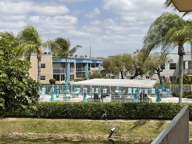 FURNISHED TURNKEY WITH A MASON & HAMLIN GRAND PIANO  in the on Kings Point Golf -Flanders Way in Florida - for sale on GolfHomes.com, golf home, golf lot
