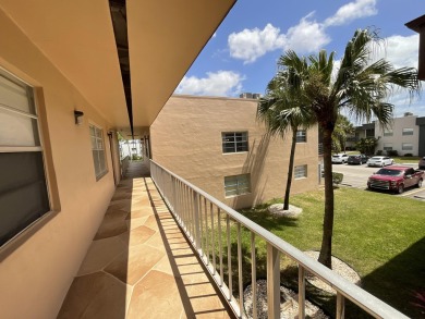 FURNISHED TURNKEY WITH A MASON & HAMLIN GRAND PIANO  in the on Kings Point Golf -Flanders Way in Florida - for sale on GolfHomes.com, golf home, golf lot