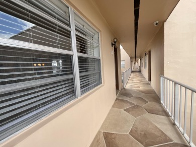 FURNISHED TURNKEY WITH A MASON & HAMLIN GRAND PIANO  in the on Kings Point Golf -Flanders Way in Florida - for sale on GolfHomes.com, golf home, golf lot