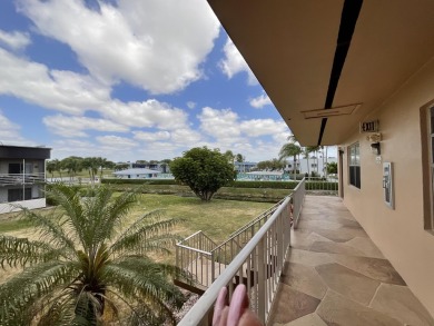 FURNISHED TURNKEY WITH A MASON & HAMLIN GRAND PIANO  in the on Kings Point Golf -Flanders Way in Florida - for sale on GolfHomes.com, golf home, golf lot