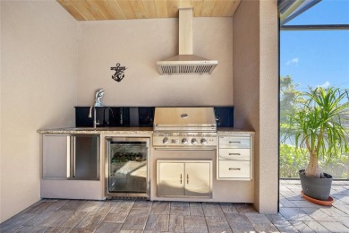 Punta Gorda Isles! Experience luxury living at its finest in on Saint Andrews South Golf Club in Florida - for sale on GolfHomes.com, golf home, golf lot