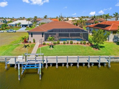Punta Gorda Isles! Experience luxury living at its finest in on Saint Andrews South Golf Club in Florida - for sale on GolfHomes.com, golf home, golf lot