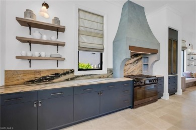 This residence has been completely reimagined in 2024 with a on Grey Oaks Golf and Country Club in Florida - for sale on GolfHomes.com, golf home, golf lot