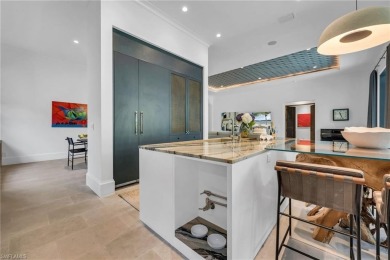 This residence has been completely reimagined in 2024 with a on Grey Oaks Golf and Country Club in Florida - for sale on GolfHomes.com, golf home, golf lot