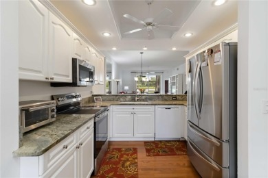 Stunning golf course and lake views await you in this on Heritage Oaks Golf and Country Club in Florida - for sale on GolfHomes.com, golf home, golf lot