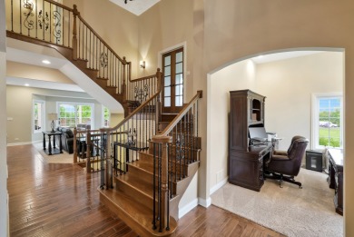 Custom home with 4 spacious bedrooms, 4.5 bathrooms nestled on on Blackstone Golf Club in Illinois - for sale on GolfHomes.com, golf home, golf lot