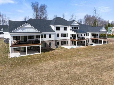 Discover luxury living at 804 Fairways Drive. Located in the on Birchwood Farms Golf and Country Club in Michigan - for sale on GolfHomes.com, golf home, golf lot