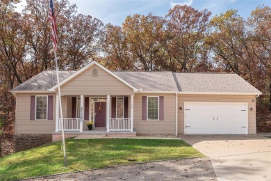 When you pull into the gates of Raintree you can start living a on Raintree Country Club in Missouri - for sale on GolfHomes.com, golf home, golf lot