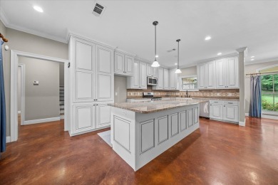 Custom home nestled on a 2.5-acre lot surrounded by a lush on Bay Springs Country Club in Mississippi - for sale on GolfHomes.com, golf home, golf lot