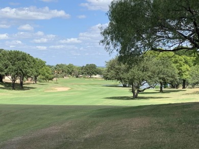 This lot has it all! When you get trees and a golf course view on Slick Rock Golf Course - Horseshoe Bay in Texas - for sale on GolfHomes.com, golf home, golf lot