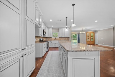 Custom home nestled on a 2.5-acre lot surrounded by a lush on Bay Springs Country Club in Mississippi - for sale on GolfHomes.com, golf home, golf lot