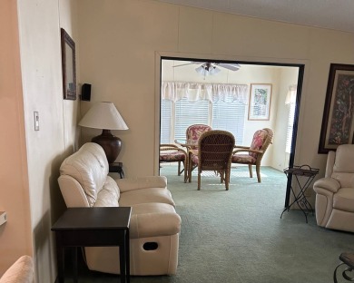 This 2-bedroom, 2-bathroom home offers a perfect place for on Lake Henry Golf Club in Florida - for sale on GolfHomes.com, golf home, golf lot