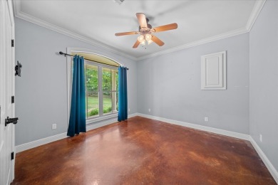 Custom home nestled on a 2.5-acre lot surrounded by a lush on Bay Springs Country Club in Mississippi - for sale on GolfHomes.com, golf home, golf lot