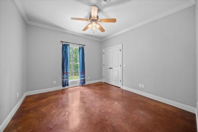 Custom home nestled on a 2.5-acre lot surrounded by a lush on Bay Springs Country Club in Mississippi - for sale on GolfHomes.com, golf home, golf lot
