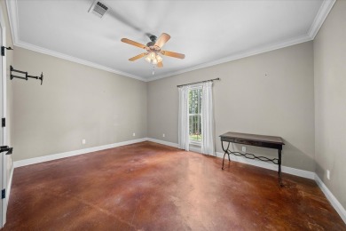Custom home nestled on a 2.5-acre lot surrounded by a lush on Bay Springs Country Club in Mississippi - for sale on GolfHomes.com, golf home, golf lot