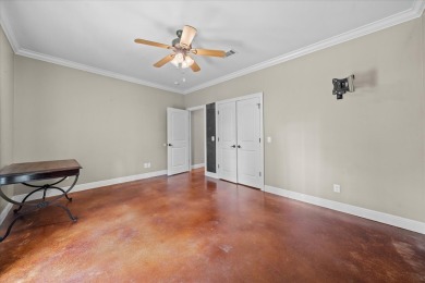 Custom home nestled on a 2.5-acre lot surrounded by a lush on Bay Springs Country Club in Mississippi - for sale on GolfHomes.com, golf home, golf lot