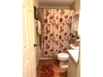 This 2-bedroom, 2-bathroom home offers a perfect place for on Lake Henry Golf Club in Florida - for sale on GolfHomes.com, golf home, golf lot