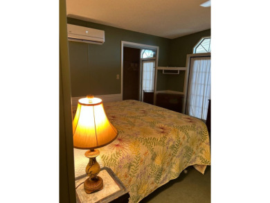 This 2-bedroom, 2-bathroom home offers a perfect place for on Lake Henry Golf Club in Florida - for sale on GolfHomes.com, golf home, golf lot
